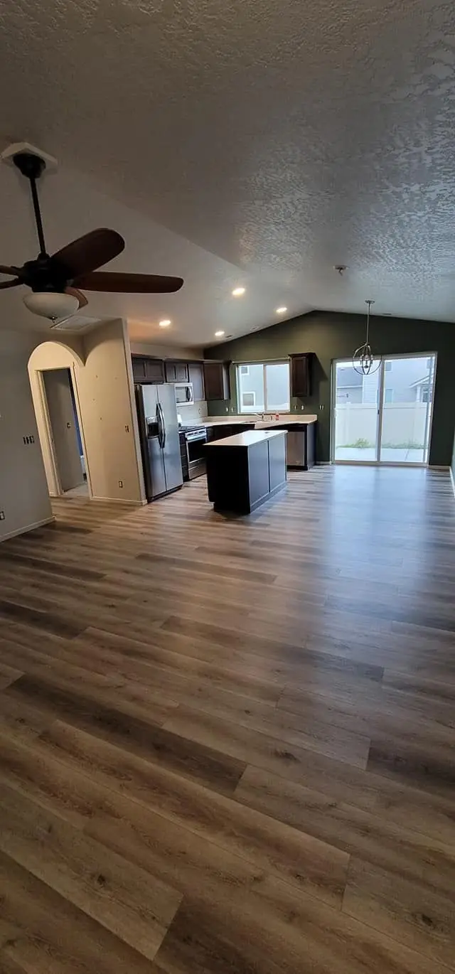 Open living space with plank flooring