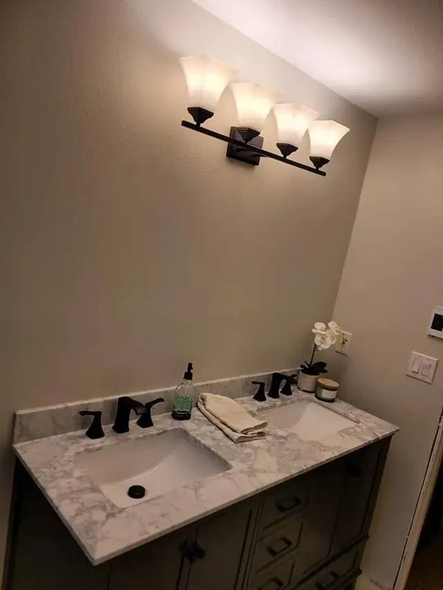 Double vanity with a marble-look countertop